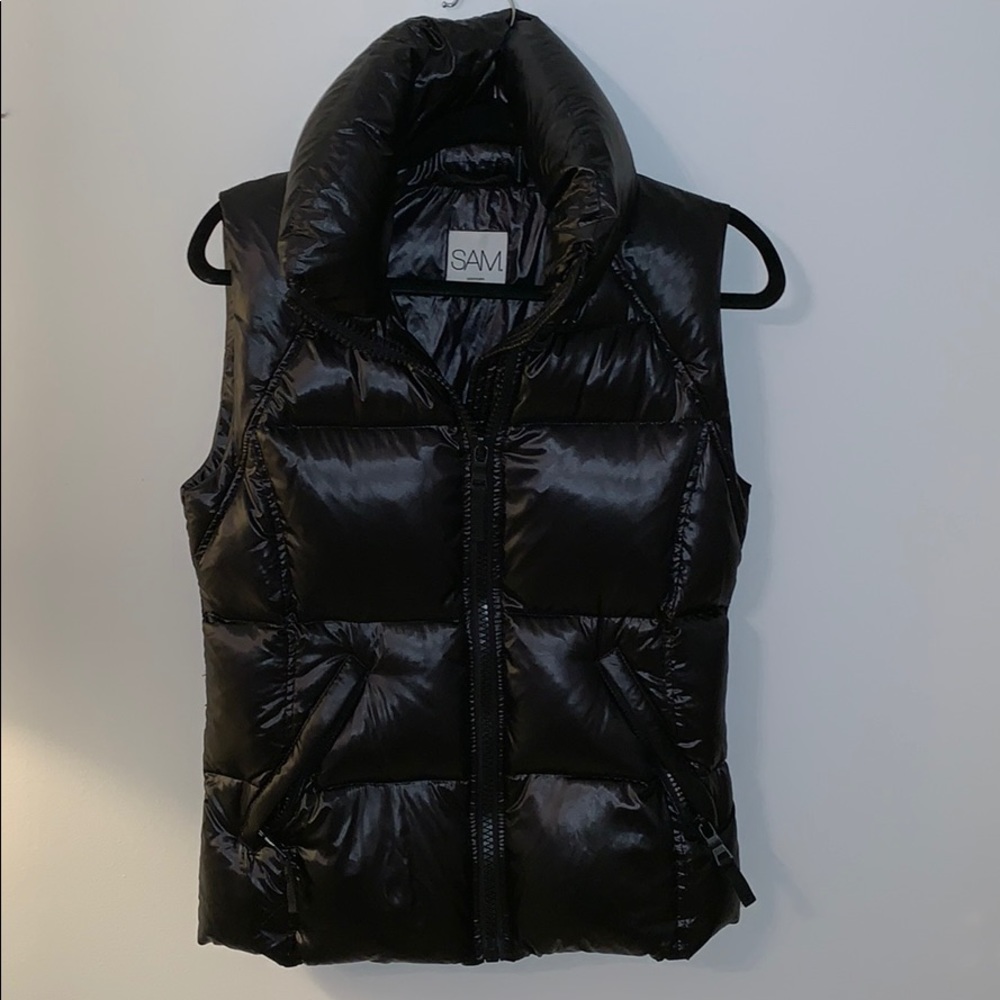 SAM. black vest